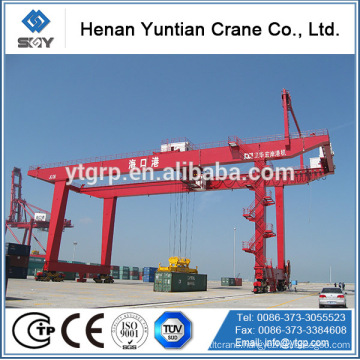 Container spreader, container stacking crane, container lifting cranes